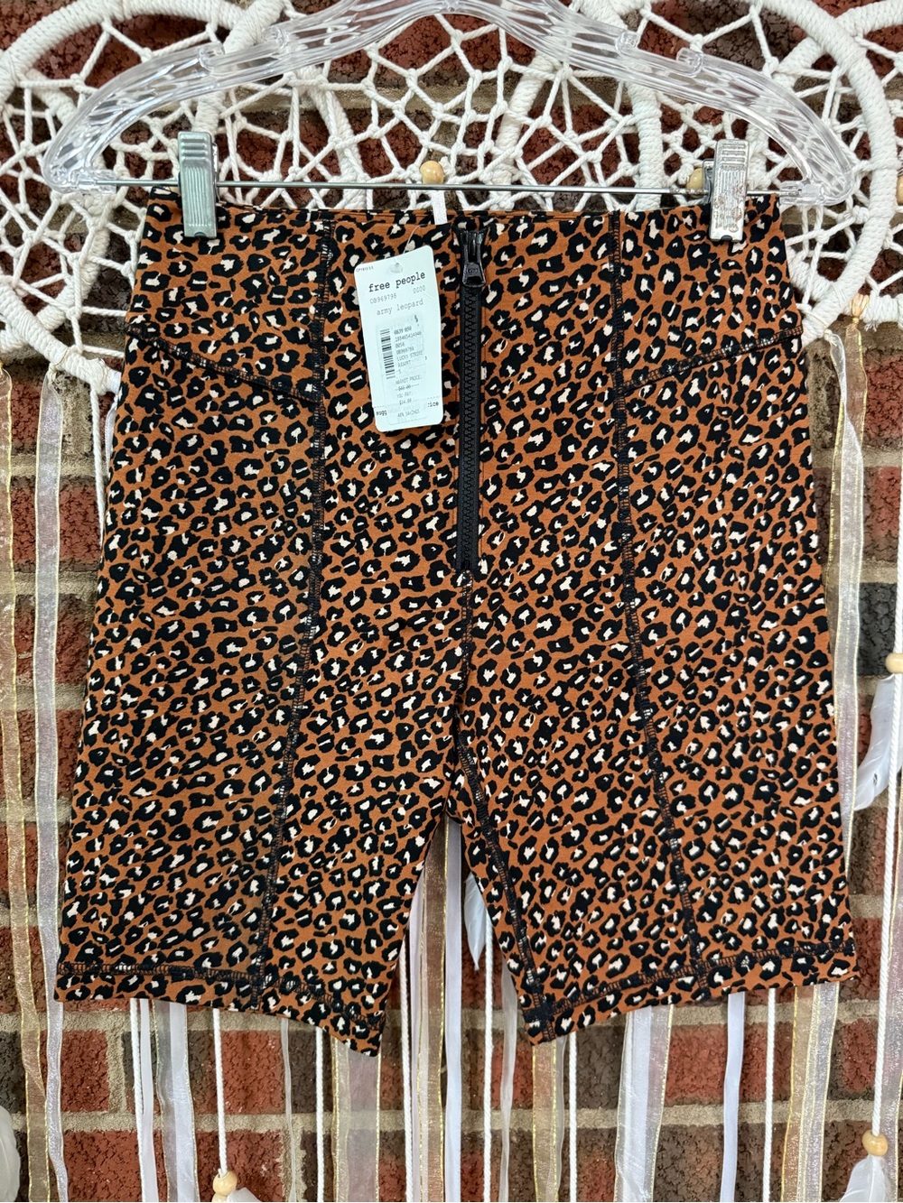 Free People Leopard Print High-Rise Bike Shorts in Rust and Black